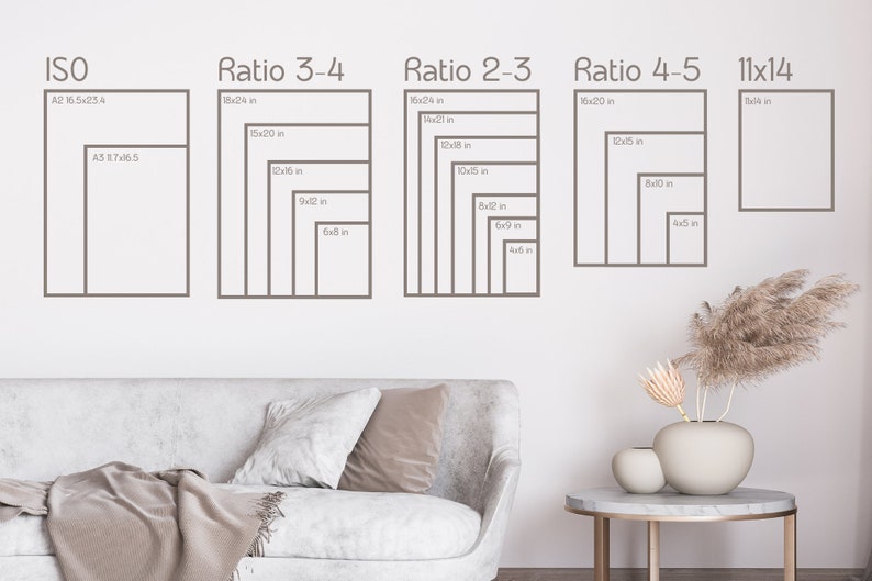 May include: A white wall with a diagram showing different print sizes in inches for various aspect ratios, including ISO, 3:4, 2:3, 4:5, and 11x14. The diagram is displayed above a white couch with a throw blanket and pillows.