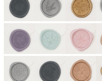 May include: Twelve different wax seals with various designs, including floral, geometric, and leafy patterns. The seals are in different colors, including black, silver, gold, copper, pink, and blue.