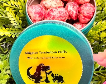 Alligator tenderloin Puffs with Calamari and Khorasan wheat, marine carotenoid, coconut