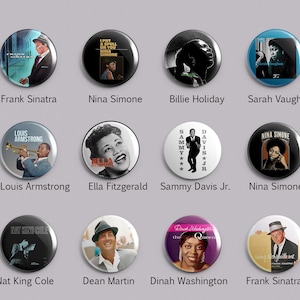 May include: A set of twelve circular pin-back buttons featuring portraits and names of jazz musicians including Frank Sinatra, Nina Simone, Billie Holiday, Sarah Vaughan, Louis Armstrong, Ella Fitzgerald, Sammy Davis Jr., Nat King Cole, Dean Martin, and Dinah Washington.