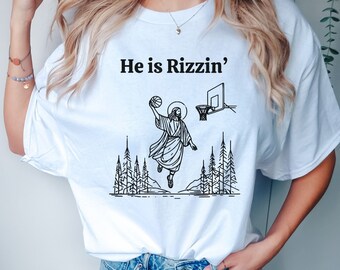 Han är Rizzin'-tröja, rolig Jesus-tröja, religiös grafisk t-shirt, retro kristen, basket-Jesus-tröja, present till kyrkan, rolig påsktröja