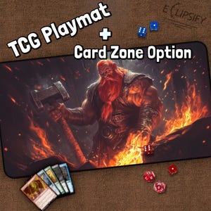 May include: A red and black TCG playmat featuring a fantasy illustration of a muscular, red-bearded man wielding a hammer in a fiery forge. The playmat includes the text "TCG Playmat + Card Zone Option".