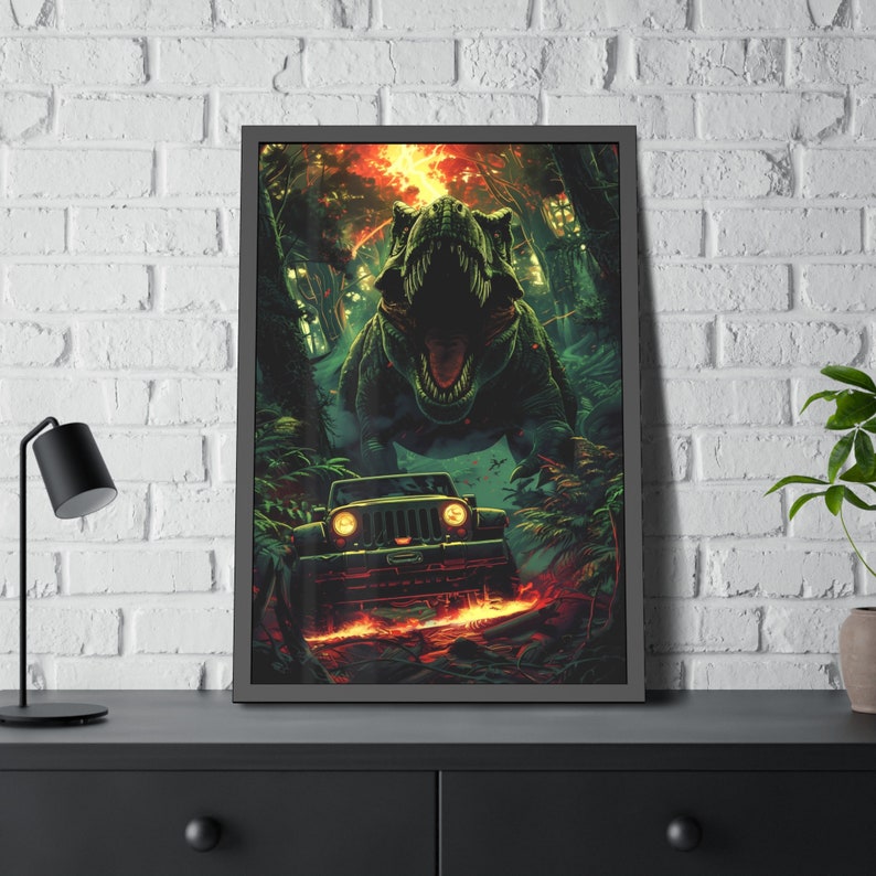 May include: A framed illustration of a green dinosaur roaring with its mouth open, standing in front of a green jeep in a jungle setting. The jeep has its headlights on and is driving through the jungle. The background is a dark green and brown color.