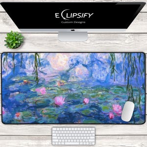 May include: A large rectangular mouse pad featuring a vibrant impressionist painting of water lilies in a pond. The artwork showcases shades of blue, green, and pink, with a white mouse and keyboard visible below. The monitor displays the "Eclipsify Custom Designs" logo.