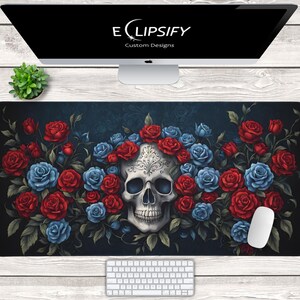 May include: A black mouse pad with a skull surrounded by red and blue roses. The skull has intricate details and is surrounded by a floral design. The text "ECLIPSIFY Custom Designs" is at the top of the mouse pad.