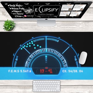 May include: A blue and black desk mat with a futuristic-looking digital display. The display shows the text "F.E.M.S 5.547.6", "17.. 41 m", and "CX. 54/38.04".