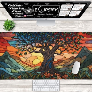 May include: A stained glass style mouse pad featuring a tree with a sunset in the background. The mouse pad is available for purchase on the website "Eclipsfy Custom Designs".