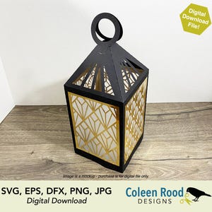 May include: A black and gold paper lantern with a geometric design. The lantern has a handle and is made of layered paper. The words "Digital Download File!" are in the upper right corner. The bottom of the image has the words "SVG, EPS, DFX, PNG, JPG Digital Download Coleen Rood DESIGNS."