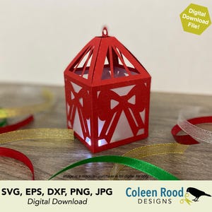 May include: A red paper lantern with a bow design, lit from within, sits on a wooden surface. Colorful ribbons in red, gold, and green are scattered around the lantern. The image includes the text "Digital Download File!"