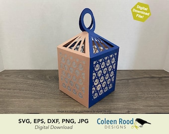 May include: A paper lantern with a geometric design. The lantern is a combination of peach and navy blue. The sides feature a cut-out pattern of circles. The top has a handle. The words "Digital Download File!" are in the upper right corner.