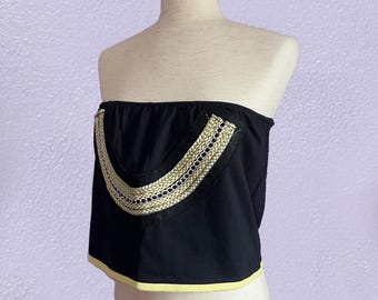 Top de tubo negro y dorado