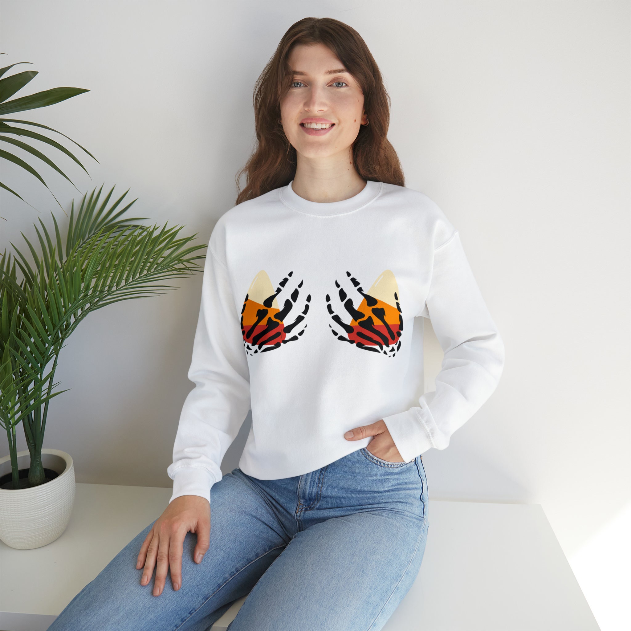 Discover Skeleton Hands | Halloween Candy | Candy Corn | Halloween Fun | Women's Sweatshirt | Unisex Heavy Blend Crewneck Sweatshirt