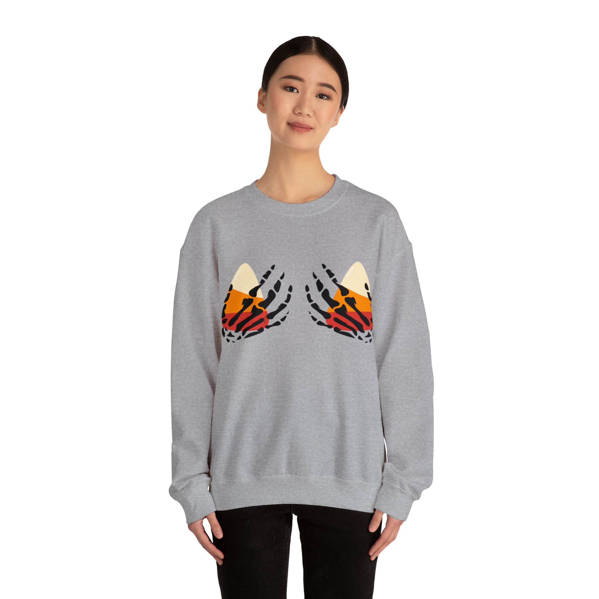 Discover Skeleton Hands | Halloween Candy | Candy Corn | Halloween Fun | Women's Sweatshirt | Unisex Heavy Blend Crewneck Sweatshirt