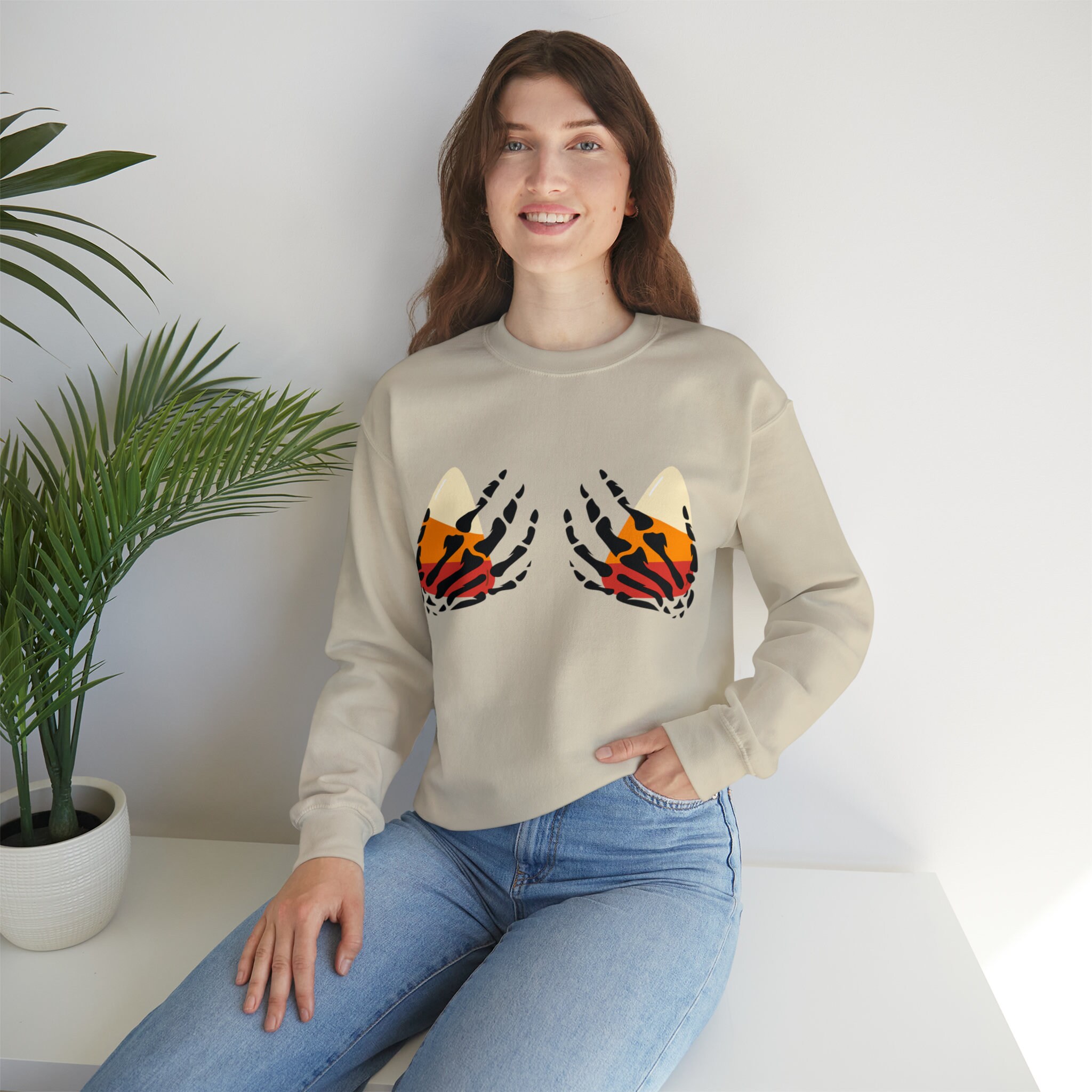 Discover Skeleton Hands | Halloween Candy | Candy Corn | Halloween Fun | Women's Sweatshirt | Unisex Heavy Blend Crewneck Sweatshirt