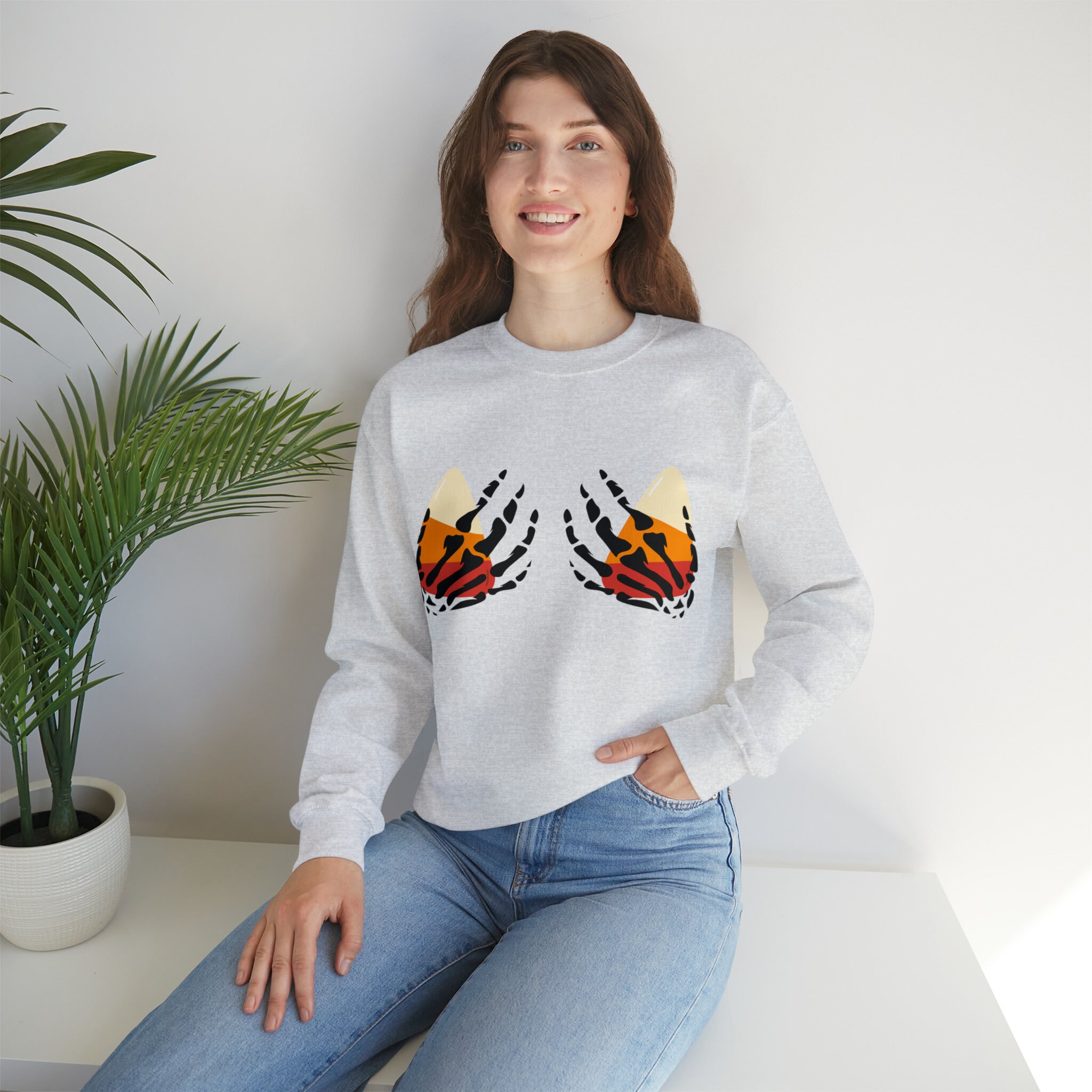 Discover Skeleton Hands | Halloween Candy | Candy Corn | Halloween Fun | Women's Sweatshirt | Unisex Heavy Blend Crewneck Sweatshirt