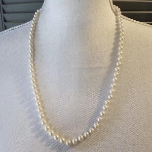 Signed Monet 90&#39;s Faux Pearl Necklace Knotted Single Strand Gold Tone Statement Costume Fashion Jewelry Collectable Vintage Estate Jewelry