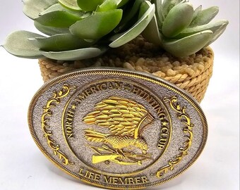 North American Hunting Club Life Member Belt Buckle Silver Gold Tone Statement Men's Accessories Collectable Vintage Estate Accessores