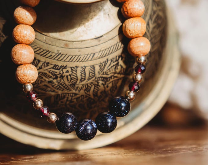 Blue Goldstone | Garnet| Metal + Wooden Beads Reiki Infused Healing Jewelry | Healing Energy | Artisan Crystal Bracelet | Stability