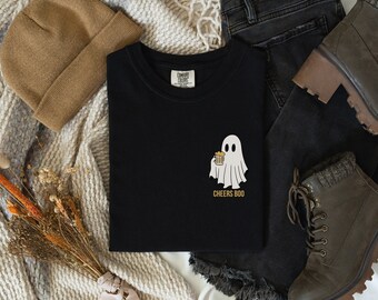May include: Black t-shirt with a white ghost holding a beer and the text "Cheers Boo".