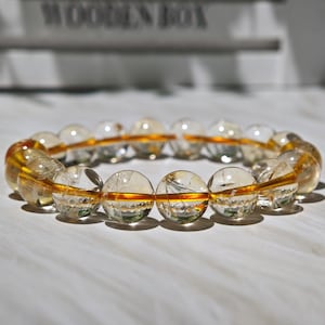 Bransoletka z naturalnego brazylijskiego cytrynu Wealth o średnicy 12 mm | Bransoletka z koralików kryształowych unisex | Prezent urodzinowy i prezent na dzień matki