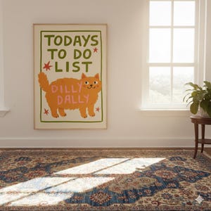 May include: A framed poster with the text "TODAYS TO DO LIST" and a cartoon cat that says "DILLY DALLY". The cat is orange with pink text and red star accents. The poster is in a room with a patterned rug and a window.
