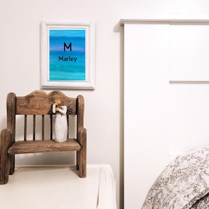 Customizable name initial wall art print, personalize with the name of your choice on background of ocean, beachy colors.