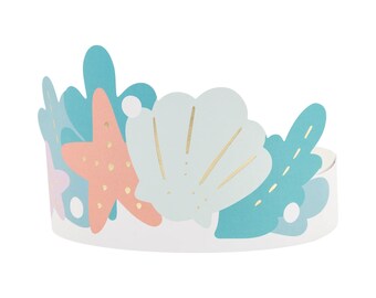 May include: A white paper crown with a blue, pink, and gold seashell design. The crown features a starfish, seashells, and seaweed.