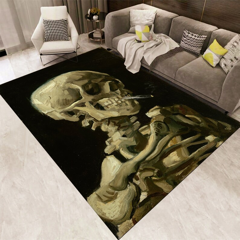 May include: A black and white rug with a painting of a skeleton holding a cigarette. The skeleton is painted in a realistic style with visible bones and a skull. The rug is a great addition to any home decor.