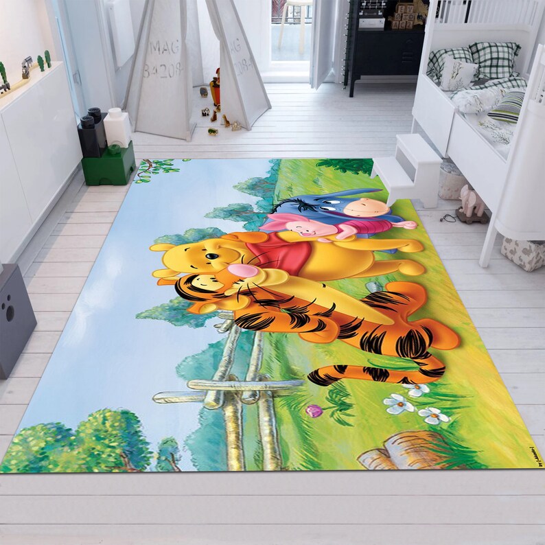May include: A Winnie the Pooh themed rug with Winnie the Pooh, Tigger, and Piglet walking through a green field with a blue sky in the background.