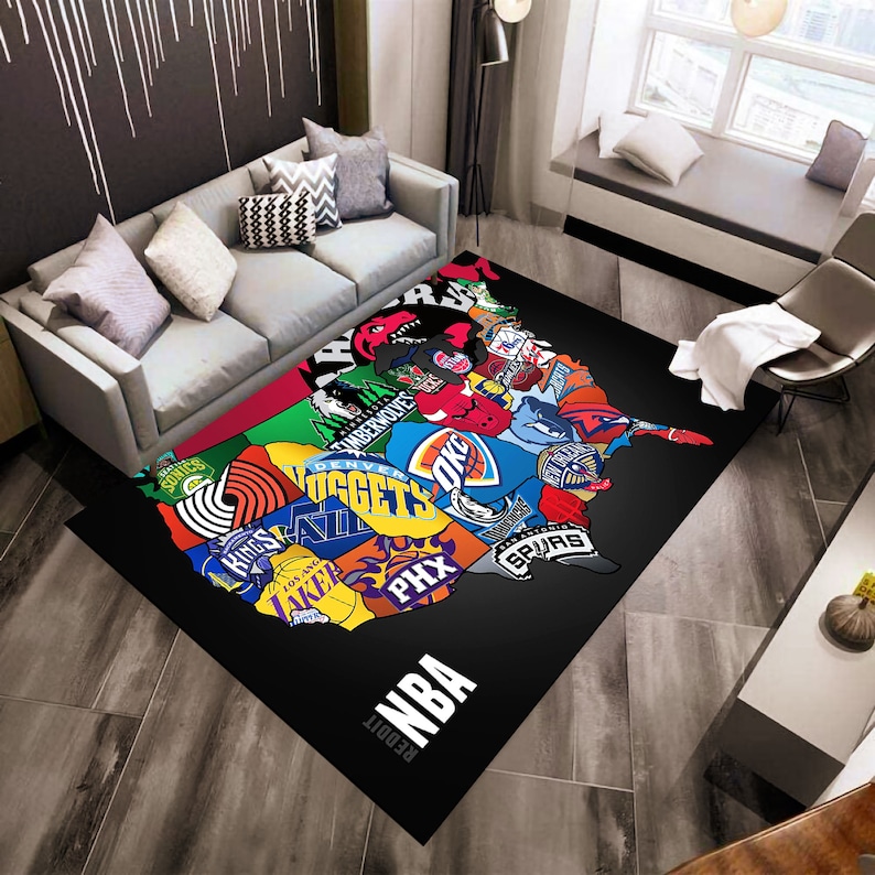 May include: A black and white rug with a map of the United States featuring logos of different NBA teams. The rug has the text "Reddit NBA" at the bottom.