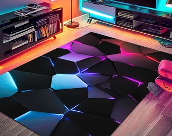 Könnte beinhalten: Ein geometrischer Teppich in Schwarz und Blau mit Neon-Pink-, Blau- und Violett-Akzenten. Der Teppich hat ein modernes, abstraktes Design und ist perfekt für ein Spielezimmer oder ein Homeoffice.