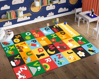 May include: A colourful alphabet play mat featuring letters, numbers, and pictures. The mat is made from soft, durable material and is ideal for children to learn and play on.