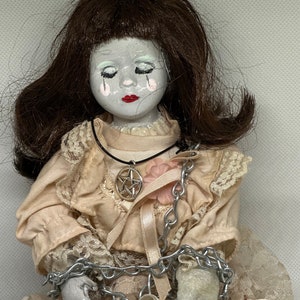 Creepy Antique China Doll Head Sticker for Sale by WandaStar
