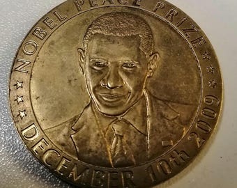United States of America Barack Obama. Nobel Peace Prize 2009. Material: gold-plated bronze. Weight: approx. 28g.