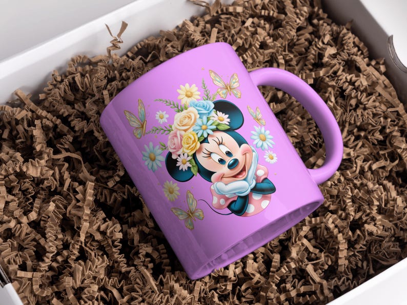 May include: A purple ceramic mug with a floral design featuring a cartoon character with a flower crown. The character is wearing a red and white polka dot dress.