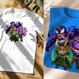 May include: Two t-shirts, one white and one blue, featuring a cartoon graphic of Venom, Loki, and Thanos. The white shirt has the graphic centered, while the blue shirt displays it at an angle. The characters are depicted in a chibi style.
