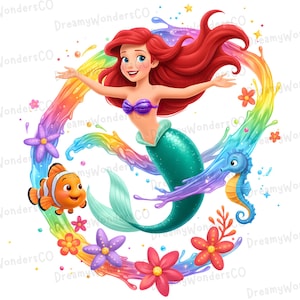 May include: A digital illustration of a mermaid with red hair, a purple top, and a green tail, surrounded by a rainbow-colored splash. A clownfish and seahorse are also featured, along with colorful flowers. The text "Dreamy Wonders CO" is visible.