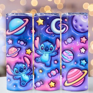 May include: Three stainless steel tumblers with a colorful space-themed design featuring the character Stitch. The design includes planets, stars, candy, and a blue and pink color scheme. The tumblers are cylindrical and appear to be approximately 8 inches tall.