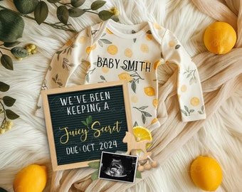 May include: A black letter board with the text "We've been keeping a juicy secret. Due: Oct. 2024". A white onesie with yellow lemons and the text "Baby Smith" is next to the letter board. A small wooden rocking horse and a sonogram are also in the image.