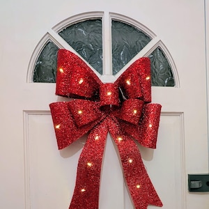Lightupbow, grote rode glitterkerststrik met led-lampjes – handgemaakte feestelijke deurdecoratie luxe led
