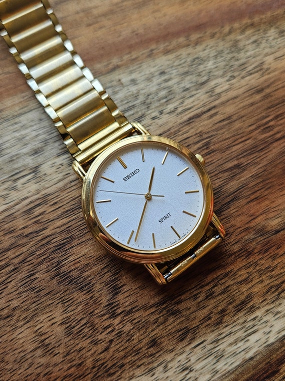 Seiko Spirit Gold Quartz Dress Watch with Metal Band … Gem
