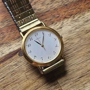 Seiko Gold & White Dial Unisex Quartz Watch - 5P31-6C9A