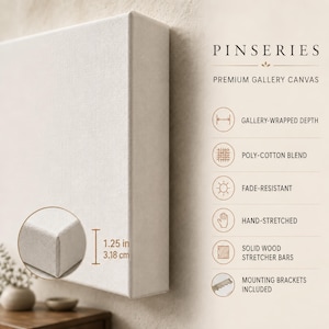 May include: A blank off-white gallery-wrapped canvas with a depth of 3.18 cm. The text reads PINSERIES PREMIUM GALLERY CANVAS, GALLERY-WRAPPED DEPTH, POLY-COTTON BLEND, FADE-RESISTANT, HAND-STRETCHED, SOLID WOOD STRETCHER BARS, MOUNTING BRACKETS INCLUDED.