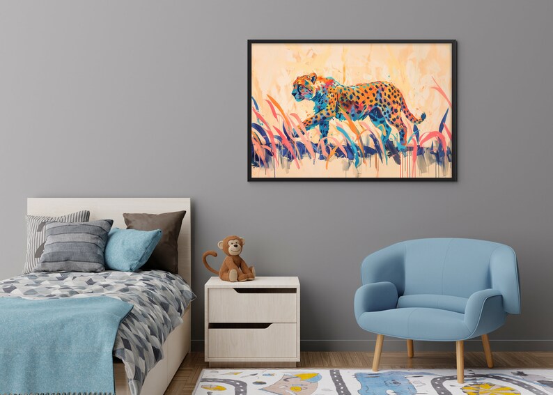May include: A framed art print featuring a colorful cheetah walking through tall grass. The cheetah is depicted with orange, blue, and yellow spots. The artwork has a watercolor style and is set against a light orange background.