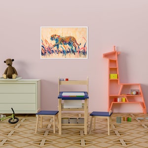 May include: A framed watercolor painting of a cheetah in a child's room. The cheetah is depicted with colorful spots and is running through tall grass. The room has a pink wall, a light green dresser, and a giraffe-shaped bookshelf.