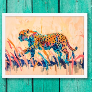 May include: A framed art print featuring a colorful cheetah walking through tall grass. The cheetah is painted with orange, blue, and black spots. The background is a light peach color, and the grass is pink and blue.