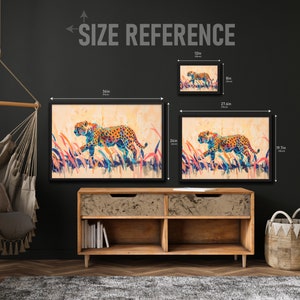 May include: Framed art prints featuring a colorful cheetah in a field of tall grass. The largest print is 36 inches wide by 24 inches tall. The image includes the text "SIZE REFERENCE".