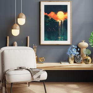 May include: A framed print of a digital painting depicting a waterfall cascading from a cliff with a large orange sun setting behind it. The scene is set in a lush green forest with a dark blue sky.