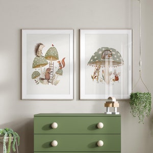 May include: A green dresser with four drawers and white knobs. Two framed illustrations of mushrooms with animals are hanging on the wall above the dresser. A wooden rocking horse and a set of wooden blocks are on the floor in front of the dresser.