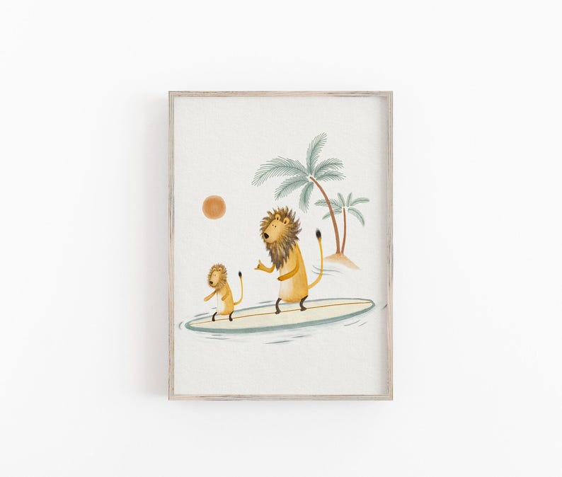 May include: A framed art print featuring two cartoon lions surfing on a surfboard in the ocean. The artwork has a light color palette with palm trees, a sun, and a light blue ocean. The lions are yellow with brown manes.